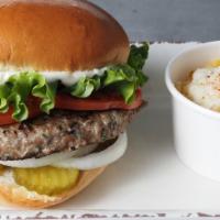 Lamb Burger · Grilled 1/2 lb. lamb patty with spicy or regular sauce , lettuce, tomatoes, pickles and onio...