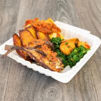 Bole combo · fried Yam, plantain, and fish served with kale-shrimp, topped with bole sauce