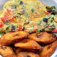 fried eggs and plantain · 
two eggs fried with carrot, red peppers, green onion, & mushroom served with fried plantain...