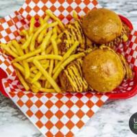  2 Sliders and Fries · Brioche bun, chicken tenders, slaw, pickles,  and house sauce. Add cheese for sliders for an...