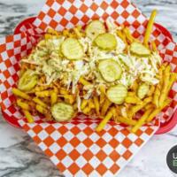 Harry's Loaded Fries · Fries topped with chicken tender, cheese, slaw, pickles, and house sauce.