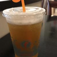 White Peach Oolong Tea · Tung-ting oolong tea, sweetened with white peach flavoring and sweetener. Shaken with ice.

