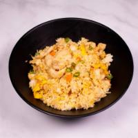 14. Chicken Fried Rice · Stir-fried rice with poultry.