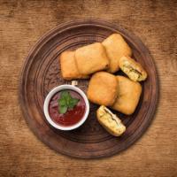 Cottage Cheese Fritters · A simple snack recipe prepared with spiced paneer cubes, coated with chickpea flour batter.
