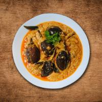 Just Eggplant Special Curry · Eggplant roasted in a tandoor and pureed cooked with fresh tomatoes, green peas, onions, spi...