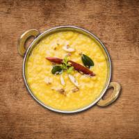 Lentil Luminate · Yellow lentils boiled and tempered with cumin, ginger, curry leaves and mustard seeds
