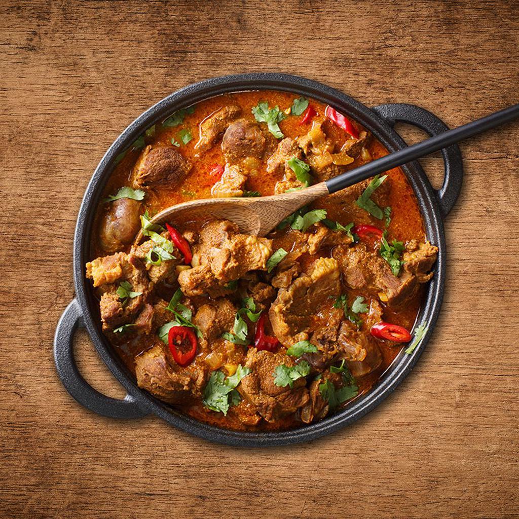 Lamb Rogan Josh · Tender meat well marinated and cooked with ginger, garlic yogurt, onion, tomato, and spiced flavour curry sauce made of Indian herbs and spices.
