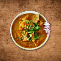 United Goat Curry  · Tender goat meat cooked slowly  with tomatoes, onions, fresh herbs and Indian spices.
