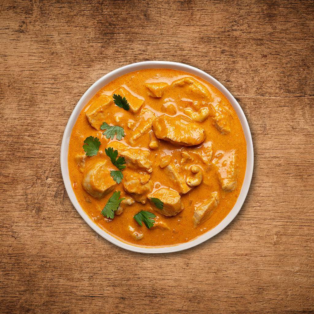 Butter Chicken Delight  · Tender chunks of char grilled tandoori chicken in a  creamy and deliciously smooth butter, tomato and cream based gravy , spiced with ginger, garlic and aromatic whole spices, served with a side of our aromatic basmati rice
