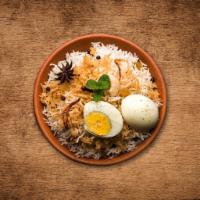 Yum Egg Biryani · Fragrant basmati rice cooked with aromatic biryani spices, herbs and boiled eggs to yield a ...