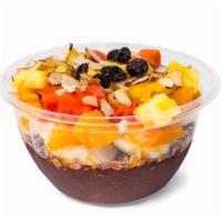 Acai Tropical · organic acai puree, banana and almond milk, topped with homemade organic granola (gluten fre...