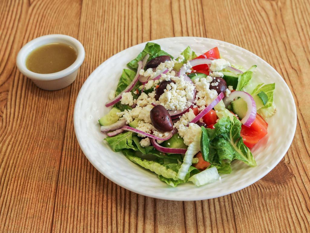 Mediterranean Salad · Our famous Mediterranean Salad comes with romaine lettuce mixed with our house-made vinaigrette dressing, tomato, cucumber, black olive, purple onions, and feta cheese.