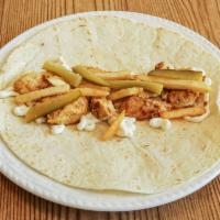 Chicken Shawarma  · Our famous shawarma spiced chicken put in a sandwich with garlic mayonnaise, Arabic style pi...