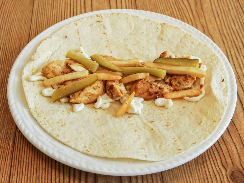 Chicken Shawarma  · Our famous shawarma spiced chicken put in a sandwich with garlic mayonnaise, Arabic style pickles, french fries all put together in a tortilla and grilled. 