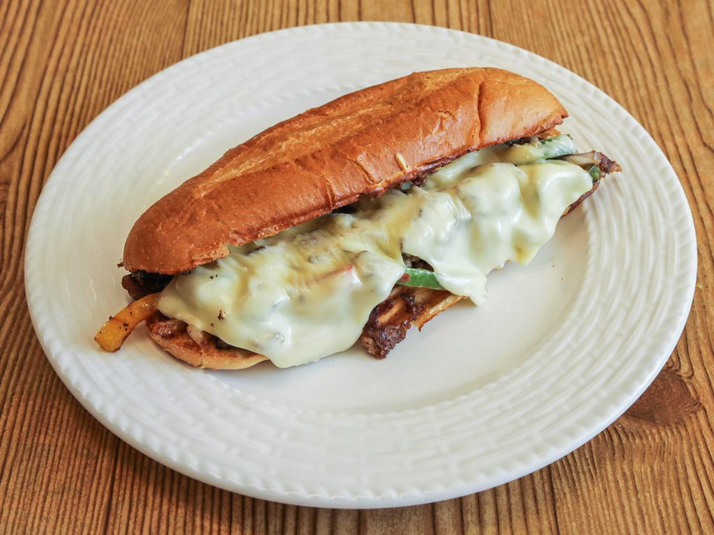 Philly Cheese Steak Sandwich · Our famous Philly Cheese Steak topped with onions, bell peppers, mayonnaise, and topped with Swiss cheese. So yummy So yummy.