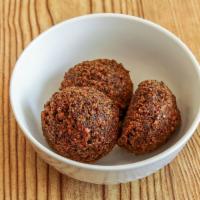 Falafel   · Our home made juicy falafel with special middle eastern spices.