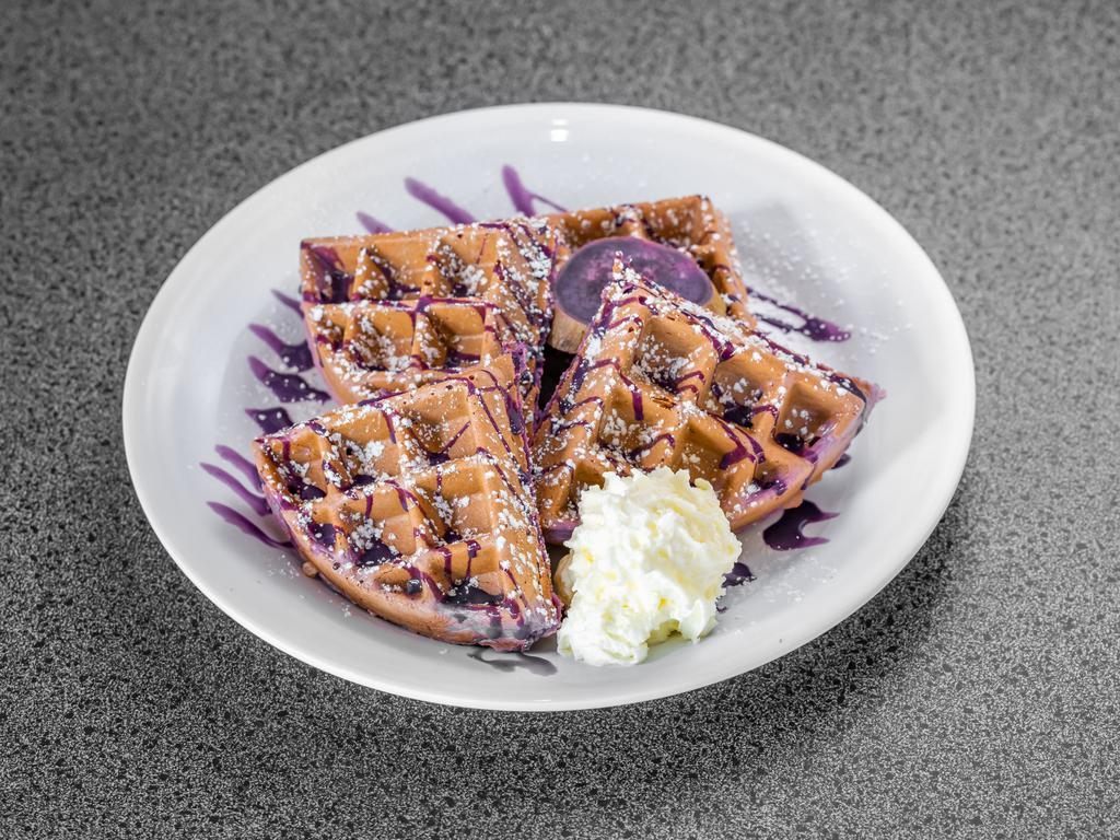 Ube Waffle · Topped with whipped cream and powdered sugar.