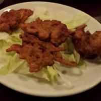 Pakora · Thin sliced fresh vegetables dipped in a special Graham batter with onions potato  and spice...