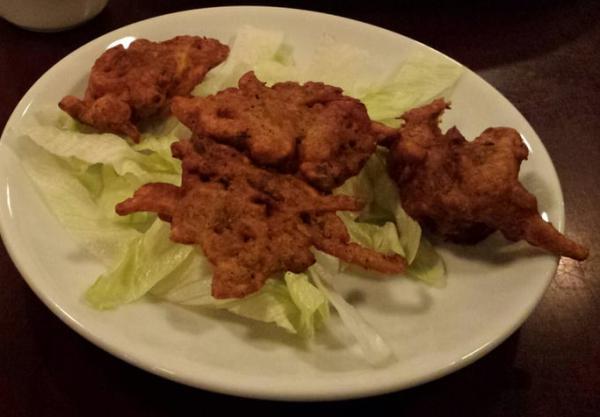 Pakora · Thin sliced fresh vegetables dipped in a special Graham batter with onions potato  and spices and then fried.