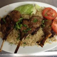 7. Lamb Chops Platter · Delicious lamb chops marinated in authentic seasonings and grilled over an open flame.