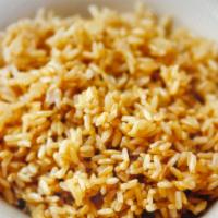 Brown Rice · Basmati rice with onion seasoning.