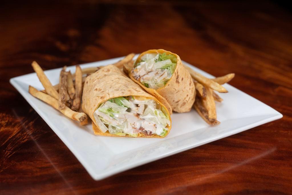 Bacon Ranch Chicken Wrap · Grilled chicken is expertly mixed with ranch dressing, bacon, lettuce, tomatoes, onions and love. Served with your choice of side.