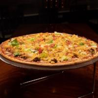 Taco Pizza · Seasoned ground beef, lettuce, tomatoes, fritos and mozzarella cheese topped with a Mexican ...