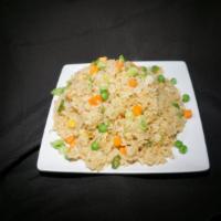 Fried Rice · Fried rice is prepared with steamed rice that is tossed in wok with soy sauce, eggs, peas, c...