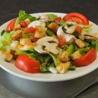 Garden Salad · Romaine lettuce, onions, green peppers, tomatoes, mushrooms, and croutons with your choice o...