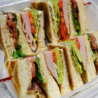 Club Sandwich Lunch · 3-decker toasted with turkey, ham and bacon with lettuce, tomato, mayo, and American cheese.