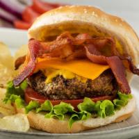 Bacon Cheese Burger · Homemade beef Patty with Bacon, Mayo, lettuce, and tomato and American Cheese.