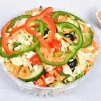 Tossed Salad · Lettuce, tomato, cucumber, carrots, peppers, black olives and choice of dressing.