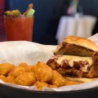 Chicken Parmesan Sandwich · Hand breaded chicken breast with our signature red sauce and melty mozzarella on a toasted b...