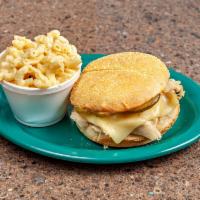 Fowl Capone Sandwich · Tender and juicy chicken marinated in our special sauce and smoked for hours. Pepper jack, p...