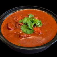 Chicken Tikka Masala · Boneless chunks of chicken cooked in a tandoori in a tomato based sauce.