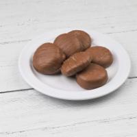 6 oz. Chocolate Jag Paws · Enjoy 6 oz. of bite sized pecan caramels enrobed in Peterbrooke’s creamy milk chocolate. The...