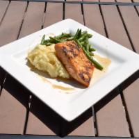 Grilled Salmon · Farm-raised salmon filet with a maple-bourbon glaze served with mashed potatoes.
