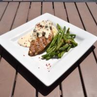 Creamy Chicken Picatta · Chicken breast with a lemon wine cream sauce, capers, and red pepper flakes.