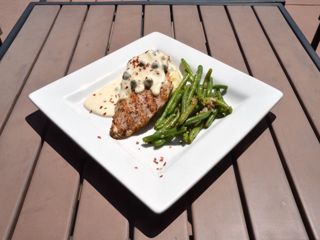 Creamy Chicken Picatta · Chicken breast with a lemon wine cream sauce, capers, and red pepper flakes.