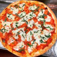 Margherita Pizza · Fresh Mozzarella, fresh basil, sliced Roma tomatoes and our homemade pizza sauce. Take our a...