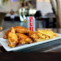 Medium Combo · 8 wings, regular fries or veggie sticks, 1 dip, and drink.