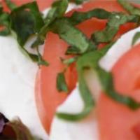Caprese Sub · Fresh mozzarella, tomato, roasted red peppers, artichoke hearts, and mixed greens topped wit...