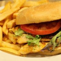 Grilled Chicken Sandwich · Half a pound of Chicken Breast char-grilled Served on a bun with lettuce ＆ tomato.