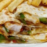 Shrimp Quesadilla · Grilled Shrimp with peppers, onions, and cheddar cheese served with sour cream