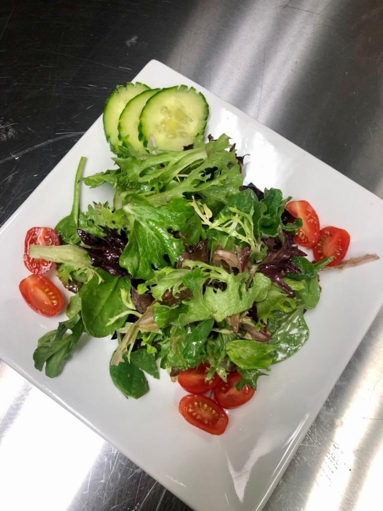 House Salad  · organic greens | cherry tomatoes | english cucumbers | champagne vinaigrette | gluten free | vegetarian