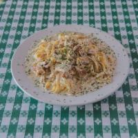 Fettuccine Alfredo a la Carte · Add chicken for an extra charge.