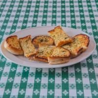 6 Piece Garlic Bread · Buttery bread that is topped with garlic.