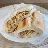 Pork Sandwich · Comes with onions and potato sticks