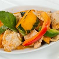 Pumpkin Curry · Pumpkin, bell pepper and basil leaves in red curry sauce.