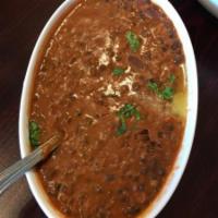 43. Dal Makhni · Black beans cooked in butter with mild spices.